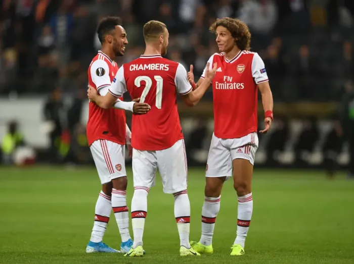 Framed Print : Arsenal Triumph: Aubameyang, Chambers, and Luiz Celebrate Europa League Victory over Eintracht Frankfurt Framed Print : Arsenal Triumph: Aubameyang, Chambers, and Luiz Celebrate Europa League Victory over Eintracht Frankfurt
