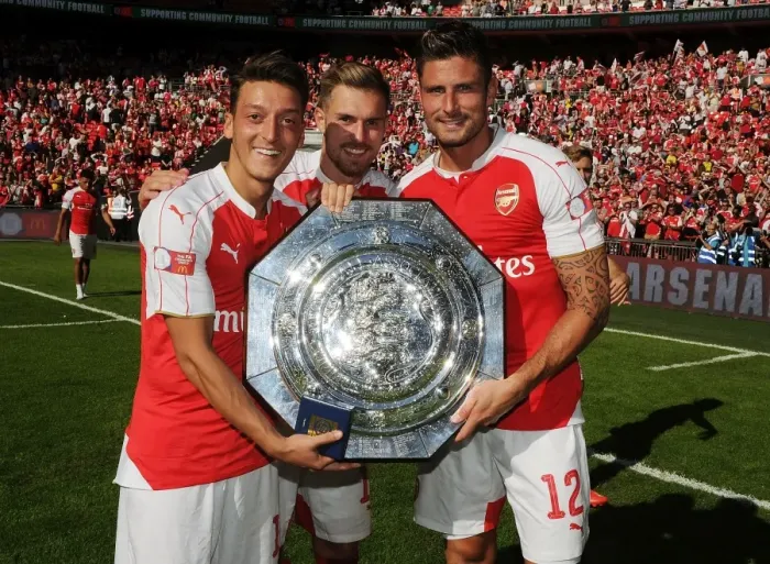Framed Print : Arsenal Triumph in Community Shield: Ozil, Ramsey, Giroud Celebrate Victory over Chelsea Framed Print : Arsenal Triumph in Community Shield: Ozil, Ramsey, Giroud Celebrate Victory over Chelsea
