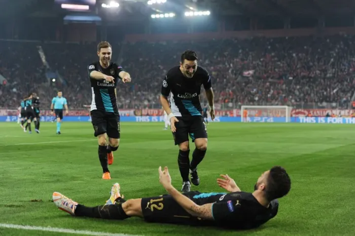 Framed Print : Arsenal Triumph: Giroud, Ozil, Ramsey Celebrate Goals Against Olympiacos in UEFA Champions League (December 2015)