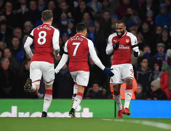 Arsenal Triumph: Lacazette, Sanchez, Ramsey Celebrate Goals Against Huddersfield Town