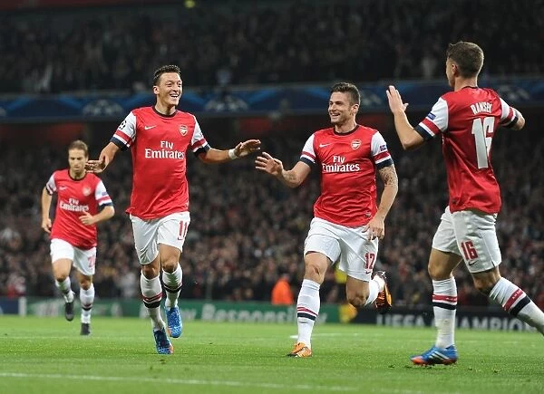 Arsenal Triumph: Ozil, Giroud, Ramsey Celebrate Goals Against Napoli in 2013-14 Champions League