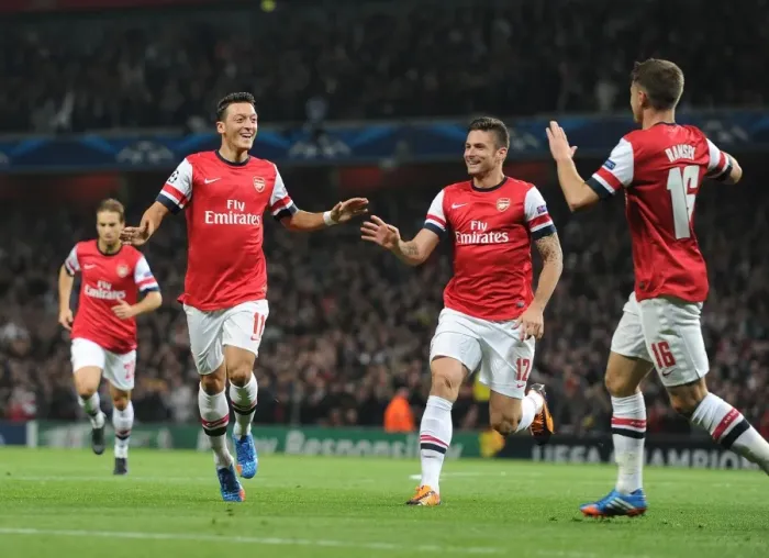 Framed Print : Arsenal Triumph: Ozil, Giroud, Ramsey Celebrate Goals Against Napoli in 2013-14 Champions League