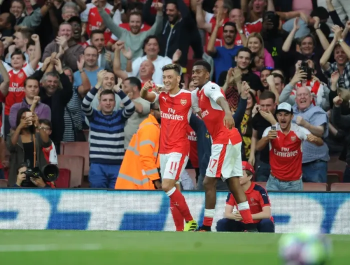 Framed Print : Arsenal Triumph: Ozil and Iwobi's Unforgettable Goal Celebration vs. Chelsea (2016-17) Framed Print : Arsenal Triumph: Ozil and Iwobi's Unforgettable Goal Celebration vs. Chelsea (2016-17)