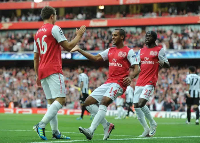 Framed Print : Arsenal Triumph: Walcott, Gervinho, Ramsey Celebrate Goal vs Udinese in 2011-12 Champions League Framed Print : Arsenal Triumph: Walcott, Gervinho, Ramsey Celebrate Goal vs Udinese in 2011-12 Champions League