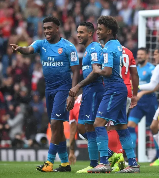 Framed Print : Arsenal Triumph: Walcott, Iwobi, Nelson in Glory: Celebrating Goals vs Benfica (Emirates Cup 2017-18) Framed Print : Arsenal Triumph: Walcott, Iwobi, Nelson in Glory: Celebrating Goals vs Benfica (Emirates Cup 2017-18)