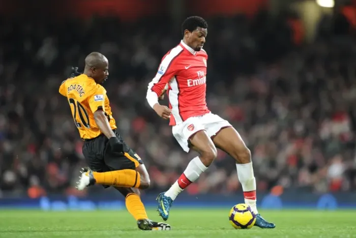 Framed Print : Arsenal Triumphs Over Hull City: Abou Diaby and George Boateng in Action during Arsenal's 3-0 Victory at Emirates Stadium, Premier League 2009-10