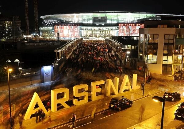 Arsenal Triumphs Over Olympiacos 3-1 in UEFA Champions League Group Stage at Emirates Stadium (2012)
