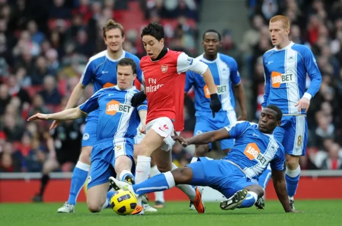 Framed Print : Arsenal Triumphs Over Wigan: Samir Nasri's Brilliant Performance Leads to a 3-0 Victory