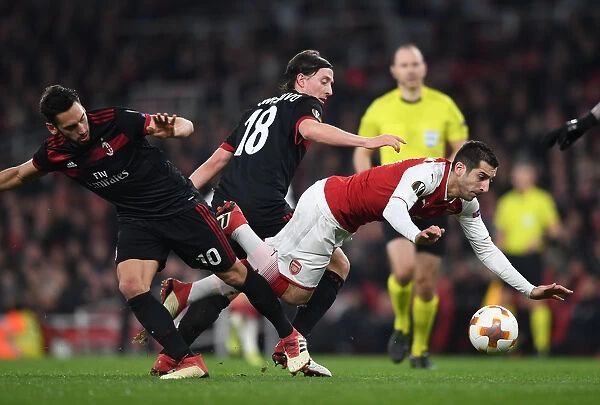 Arsenal vs AC Milan: Mkhitaryan Clashes with Calhanoglu and Montolivo in Europa League Showdown