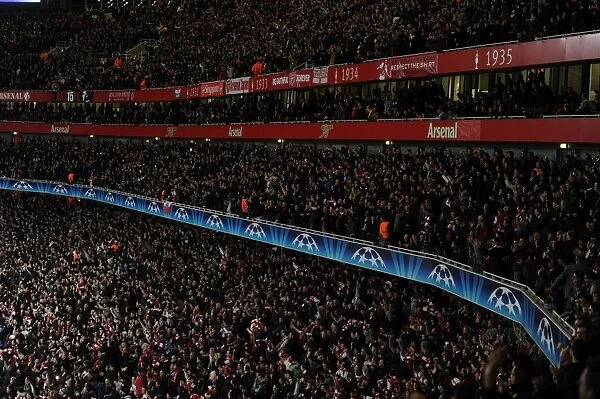 Arsenal vs AC Milan: Passionate Fans at Emirates Stadium - UEFA Champions League Round of 16