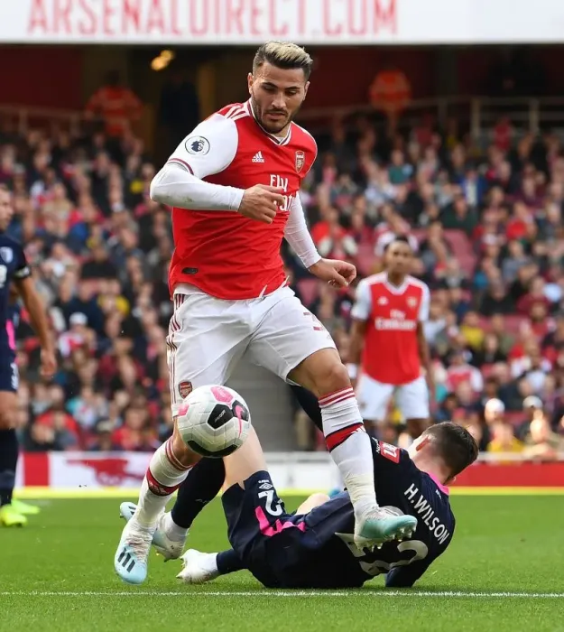 Framed Print : Arsenal vs. AFC Bournemouth: Sead Kolasinac and Harry Wilson Clash in Premier League Showdown