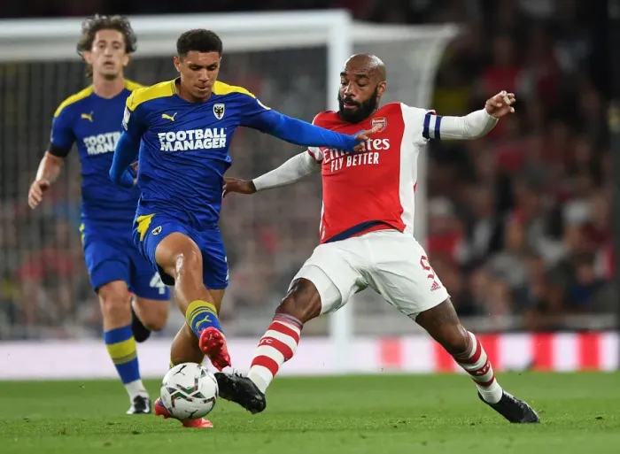 Framed Print : Arsenal vs AFC Wimbledon: Lacazette Clashes with Lawrence in Carabao Cup Showdown Framed Print : Arsenal vs AFC Wimbledon: Lacazette Clashes with Lawrence in Carabao Cup Showdown