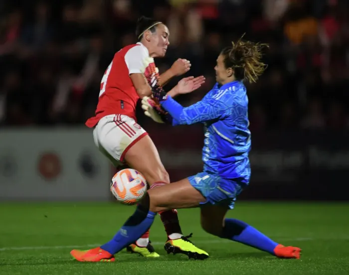 Framed Print : Arsenal vs. Ajax: A Clash in the UEFA Women's Champions League - Caitlin Foord and Lize Kop Collide