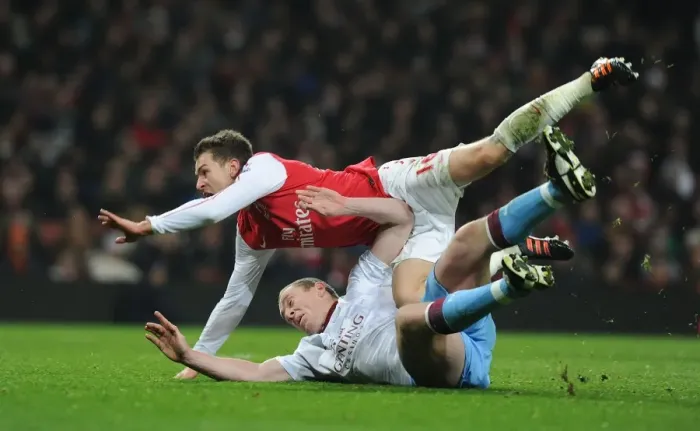 Framed Print : Arsenal vs Aston Villa: FA Cup Drama - Ramsey Penalty Decided by Dunne Foul