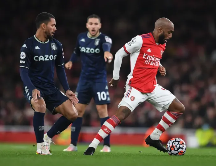 Framed Print : Arsenal vs Aston Villa: Lacazette vs Douglas Luiz Clash in Premier League Showdown Framed Print : Arsenal vs Aston Villa: Lacazette vs Douglas Luiz Clash in Premier League Showdown