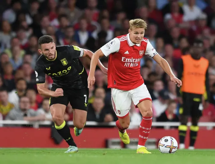 Framed Print : Arsenal vs Aston Villa: Martin Odegaard Clashes with John McGinn in Premier League Showdown (2022-23) Framed Print : Arsenal vs Aston Villa: Martin Odegaard Clashes with John McGinn in Premier League Showdown (2022-23)