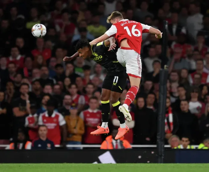 Framed Print : Arsenal vs Aston Villa: Rob Holding Wins Aerial Battle in 2022-23 Premier League Clash