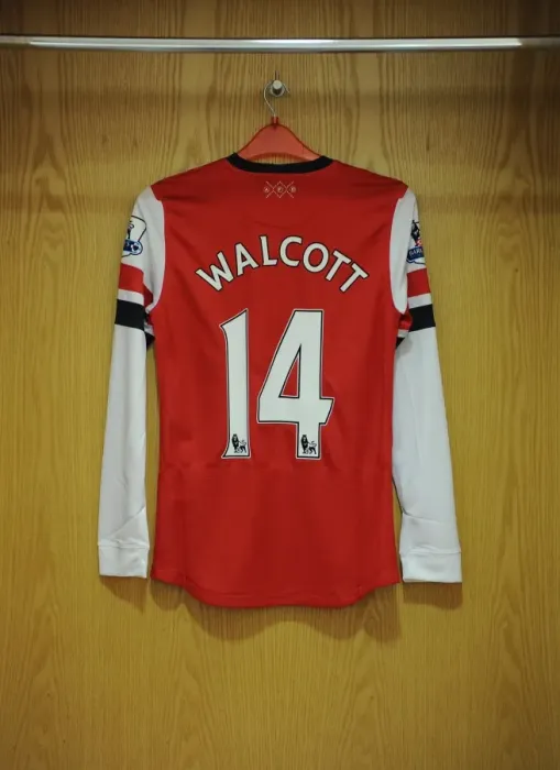 Framed Print : Arsenal vs Aston Villa: Theo Walcott's Jersey at Emirates Stadium (2012-13)
