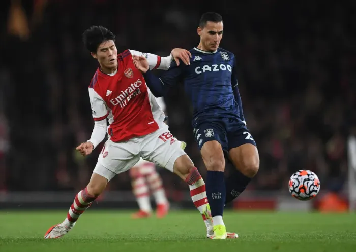 Framed Print : Arsenal vs Aston Villa: Tomiyasu vs El Ghazi - Premier League Clash at Emirates Stadium