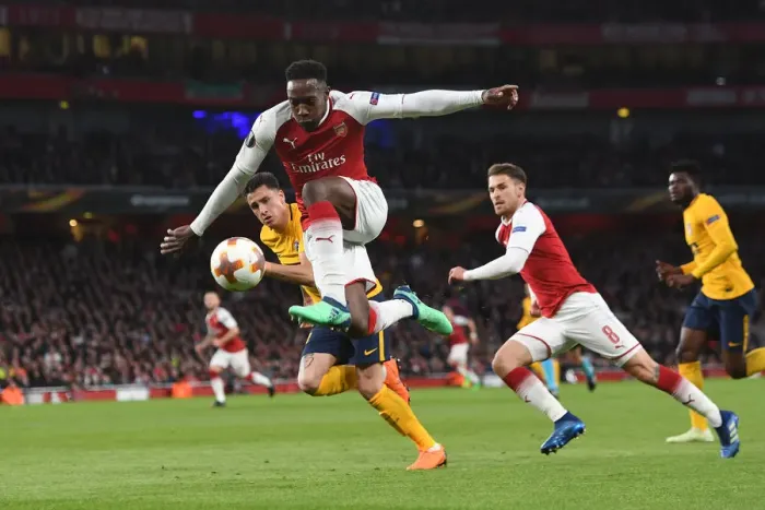 Framed Print : Arsenal vs Atletico Madrid: Tense Battle - Welbeck vs Gimenez in Europa League Semi-Final