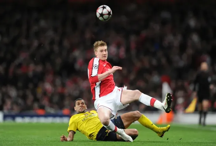 Framed Print : Arsenal vs. Barcelona: Bendtner vs. Alves - Thrilling 2:2 Stalemate in the Champions League Quarterfinals