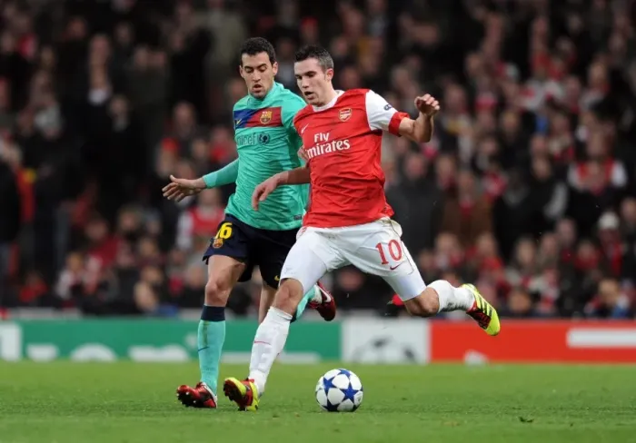 Framed Print : Arsenal vs Barcelona: Robin van Persie vs Sergio Busquets - Arsenal Leads 2:1 in UEFA Champions League Framed Print : Arsenal vs Barcelona: Robin van Persie vs Sergio Busquets - Arsenal Leads 2:1 in UEFA Champions League