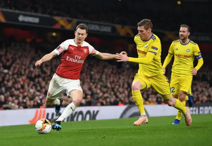 Framed Print : Arsenal vs BATE Borisov: A Battle of Lichtsteiner and Filipovic in the Europa League