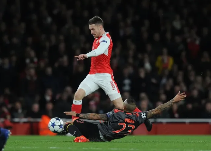 Framed Print : Arsenal vs. Bayern Munich: Aaron Ramsey vs. Arturo Vidal Clash in Champions League Showdown