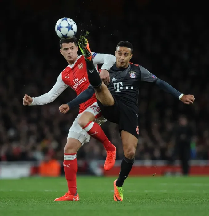 Framed Print : Arsenal vs. Bayern Munich: Granit Xhaka vs. Thiago Alcantara Clash in Champions League Showdown Framed Print : Arsenal vs. Bayern Munich: Granit Xhaka vs. Thiago Alcantara Clash in Champions League Showdown