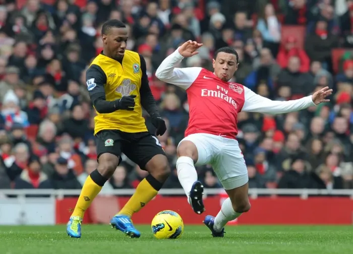 Framed Print : Arsenal vs. Blackburn Rovers: Coquelin Tackles Hoilett in Premier League Clash Framed Print : Arsenal vs. Blackburn Rovers: Coquelin Tackles Hoilett in Premier League Clash