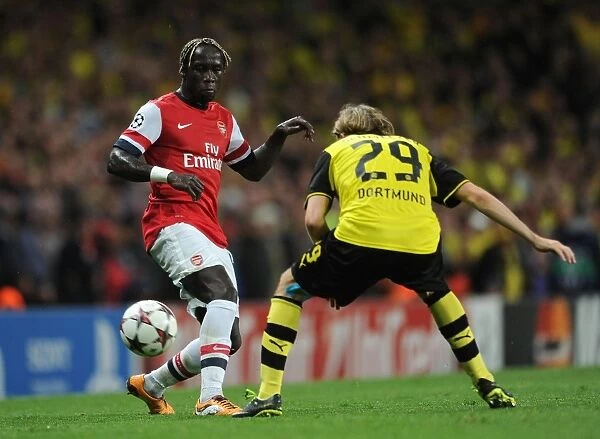 Arsenal vs. Borussia Dortmund: Clash of Sagna and Schelzer in the 2013-14 UEFA Champions League