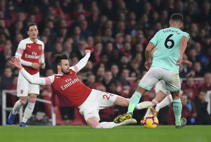 Framed Print : Arsenal vs Bournemouth: Jenkinson Tackles Surman in Intense Premier League Clash