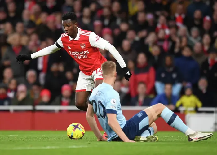 Framed Print : Arsenal vs Brentford: Eddie Nketiah Clashes with Kristoffer Ajer in Premier League Showdown at Emirates Stadium