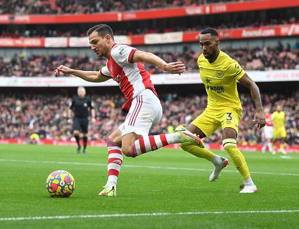 Arsenal vs Brentford: Cedric Clashes with Rico Henry in Premier League Showdown