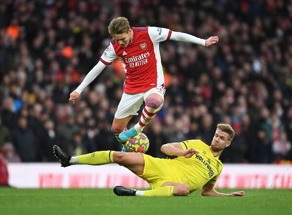 Arsenal vs Brentford: Martin Odegaard Clashes with Kristoffer Ajer in Premier League Showdown