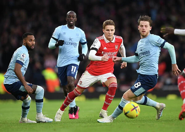 Arsenal vs. Brentford: Martin Odegaard Clashes with Defenders in Premier League Showdown