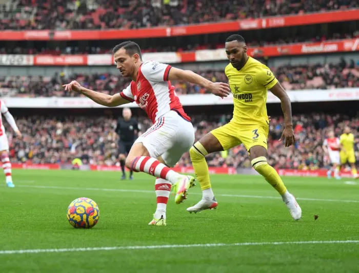 Framed Print : Arsenal vs Brentford: A Premier League Battle - Cedric vs Rico Henry Framed Print : Arsenal vs Brentford: A Premier League Battle - Cedric vs Rico Henry