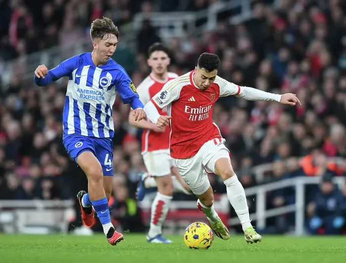 Framed Print : Arsenal vs Brighton: Gabriel Magalhães Under Pressure in 2023-24 Premier League Clash