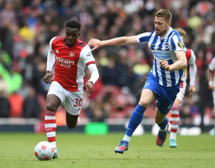 Framed Print : Arsenal vs. Brighton: Nketiah vs. Webster Battle in Premier League Showdown