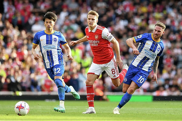Arsenal vs Brighton: Odegaard Fights for Possession in Intense Premier League Clash