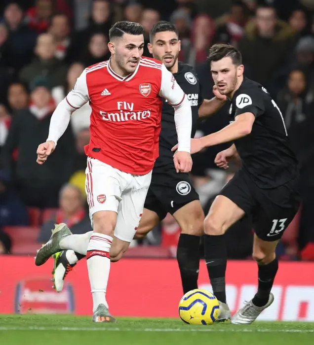 Framed Print : Arsenal vs Brighton: Sead Kolasinac Breaks Past Opponent in Premier League Clash