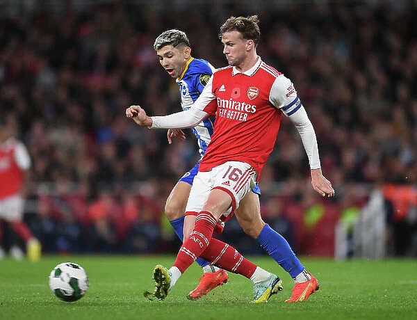 Arsenal vs Brighton: Tense Moment as Rob Holding Faces Pressure from Julio Enciso in Carabao Cup Clash