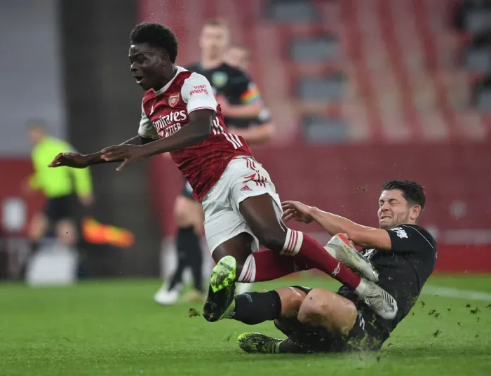 Framed Print : Arsenal vs Burnley: Bukayo Saka Faces Off Against James Tarkowski Framed Print : Arsenal vs Burnley: Bukayo Saka Faces Off Against James Tarkowski