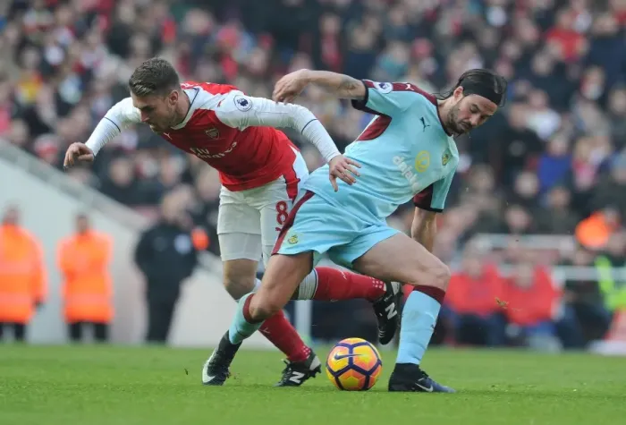 Framed Print : Arsenal vs. Burnley: Ramsey vs. Boyd Battle in the Premier League