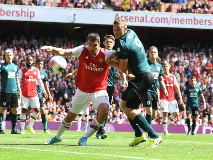 Framed Print : Arsenal vs Burnley: Sokratis and Chris Wood Clash in Premier League Showdown