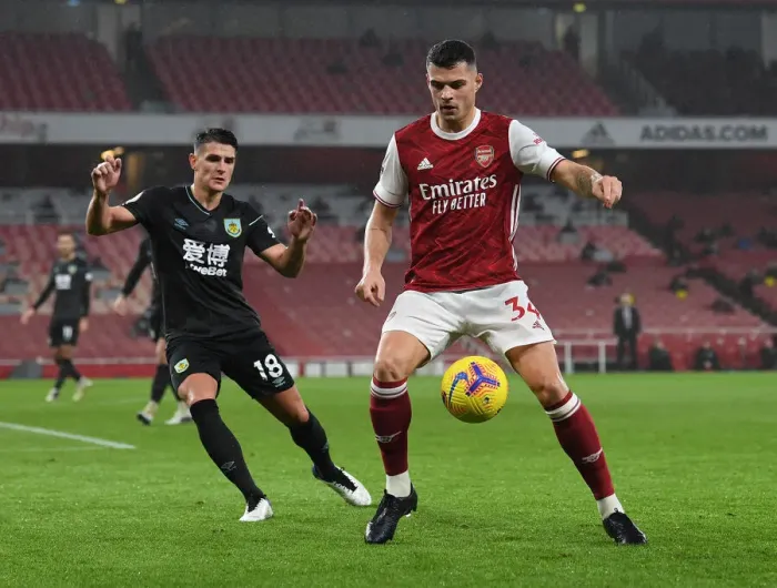 Framed Print : Arsenal vs Burnley: Xhaka Under Pressure in Premier League Clash