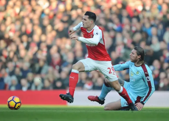 Framed Print : Arsenal vs Burnley: Xhaka vs Hendrick - Intense Battle in the Premier League