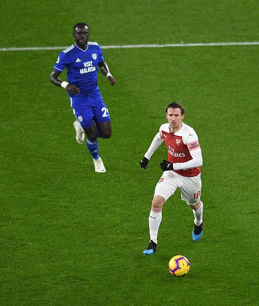 Arsenal vs. Cardiff: Monreal Clashes with Niasse in Premier League Showdown
