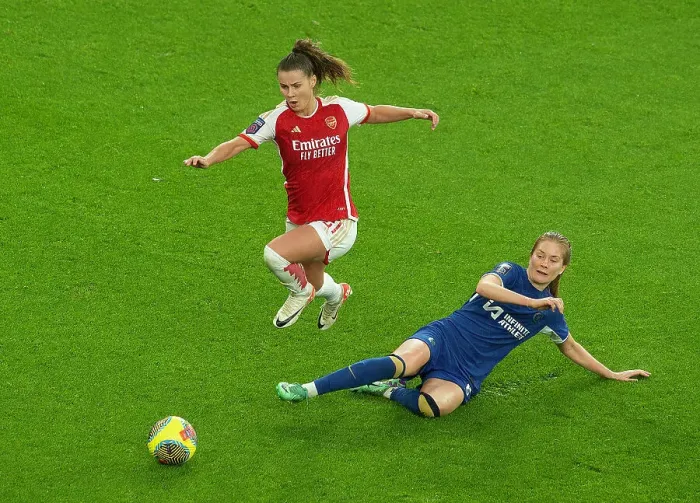 Framed Print : Arsenal vs. Chelsea: Clash in the Barclays Women's Super League (2023-24) - Pelova Leaps Over Nusken