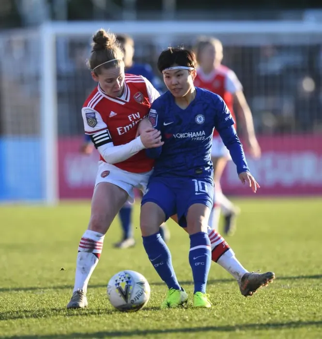 Framed Print : Arsenal vs. Chelsea: A Fierce Battle in the FA Womens Super League - Kim Little and Ji So-Yun Clash